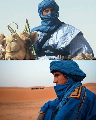 Traditional blue robes of Saharan nomads — the Tuareg and other desert peoples who maintained the caravan routes connecting Morocco to West Africa